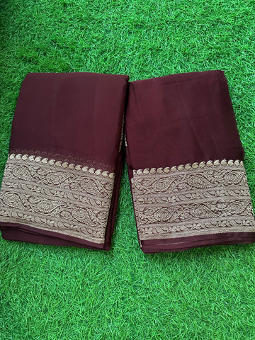 Chocolate brown,Pure khaddi Georgette,plain body rich gold zari border.