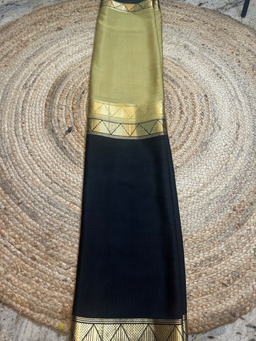 Gold and black pure Mysore Silk crepe 120 gsm half and half pattern.