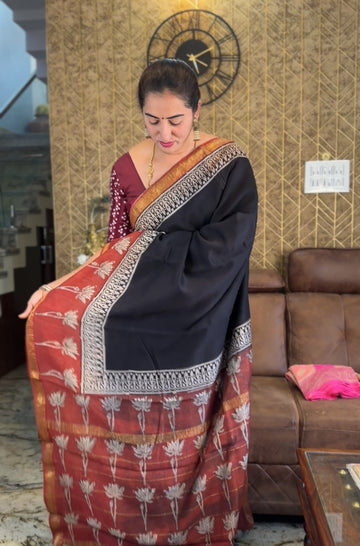 Black with brick red Maheshwari silk.