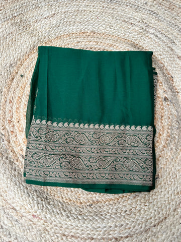 Deep green pure khaddi Georgette plain sarees with blouse