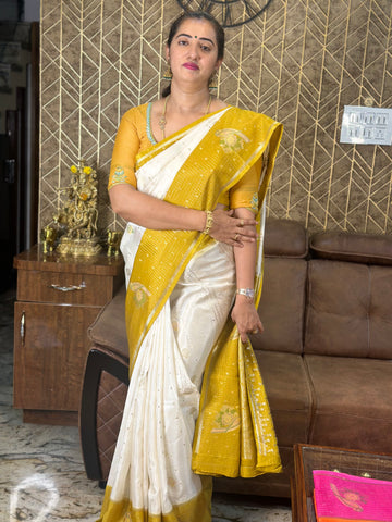 Half white with mustard dola silk.