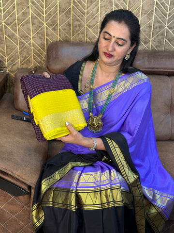 Chocolate brown with mustard semi checks crepe with designer blouse.
