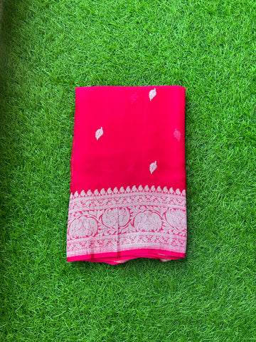 Rani pink pure khaddi chiffon sarees.