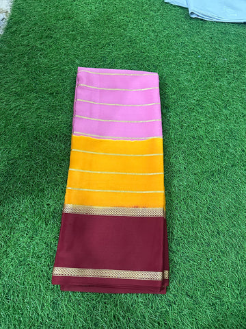 Mustard with lavender maroon border 100 gsm crepe Mysore Silk sarees