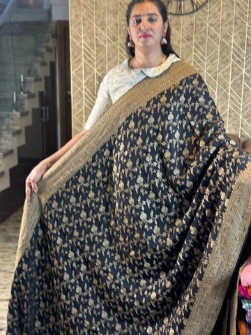 Black pure crepe Banaras jaal pattern. Self butta blouse.