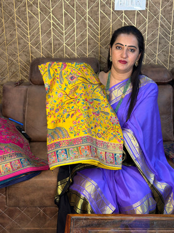 Mustard pure moonga crepe Kashmiri work all over the body.