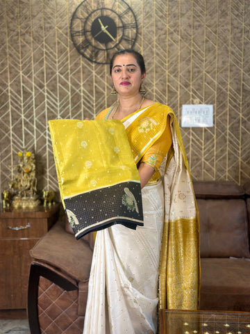 Mustard and black dola silk.