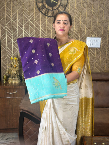 Purple and sky blue dola silk sarees.