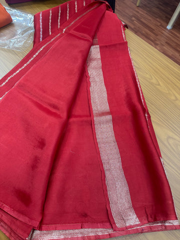 Rust orange pure satin silk sarees.