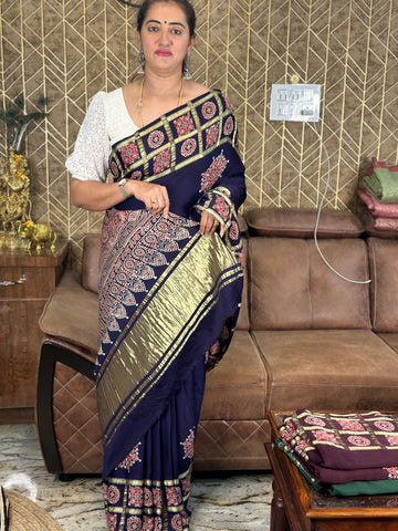 Navy blue pure modal silk with Ajrak Gajji pallu.