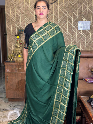 Bottle green pure modal silk sarees.