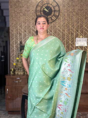 Pistha green pure tusser Paithani border.