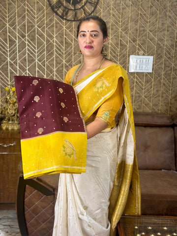 Brown and mustard dola silk with checks border.