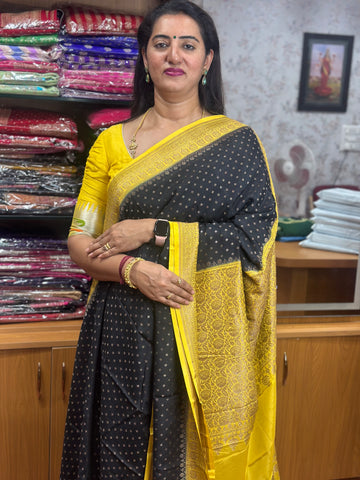 Black and yellow crepe chiffon Banarasi sarees