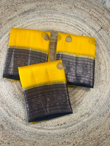 Yellow and black pure kora organza Banaras handloom silk sarees.