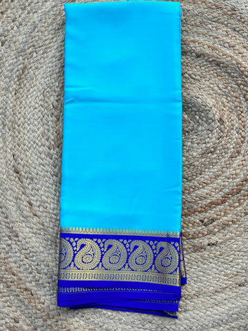 Sky blue with royal blue mango border 120 gsm pure crepe Mysore Silk