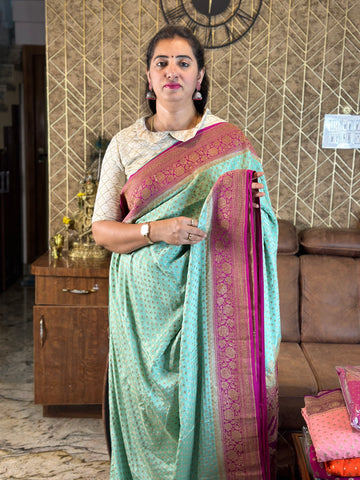 Distemper with pink pure crepe Banaras silk sarees.