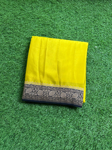 Yellow and purple pure crepe Banaras plain with brocade blouse.