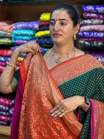 Green and orange pure crepe Banaras silk sarees.