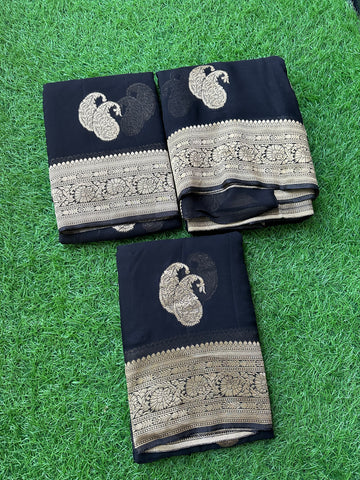Black pure viscose georgette with mango motives.