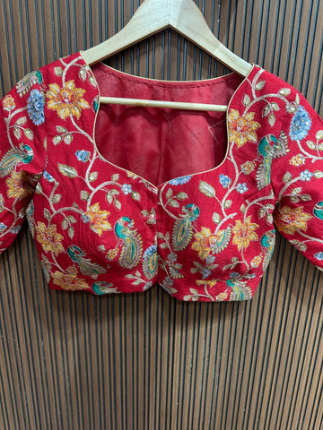 Red kalamkari stitched blouse L to XXL size margin high neck pattern.