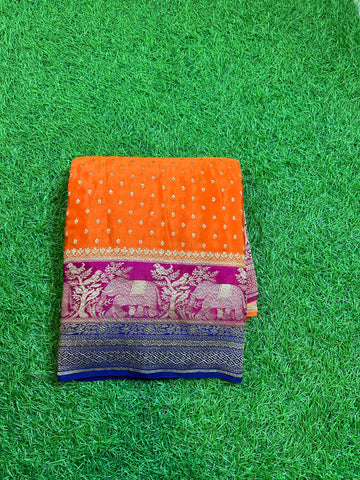 Orange and purple green pure crepe Banaras 3D pattern.