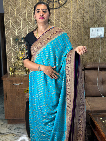 Blue with brown pure crepe Banaras sarees.