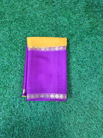 Mustard with mejentha pure wrinkle crepe saree , vertical stripes blouse.