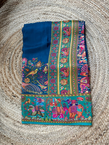 Peacock blue with pink pure moonga crepe silk with Kashmiri weaving.