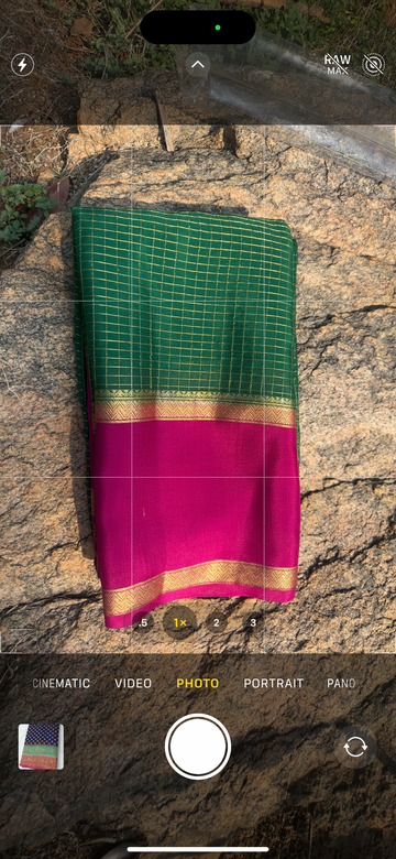 Pink with green Mysore Silk crepe checks with bentex border. 70 grams thickness.