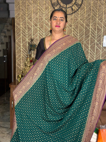 Green and mejentha pure khaddi Georgette sarees.