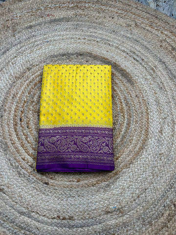 Yellow and violet crepe chiffon sarees.