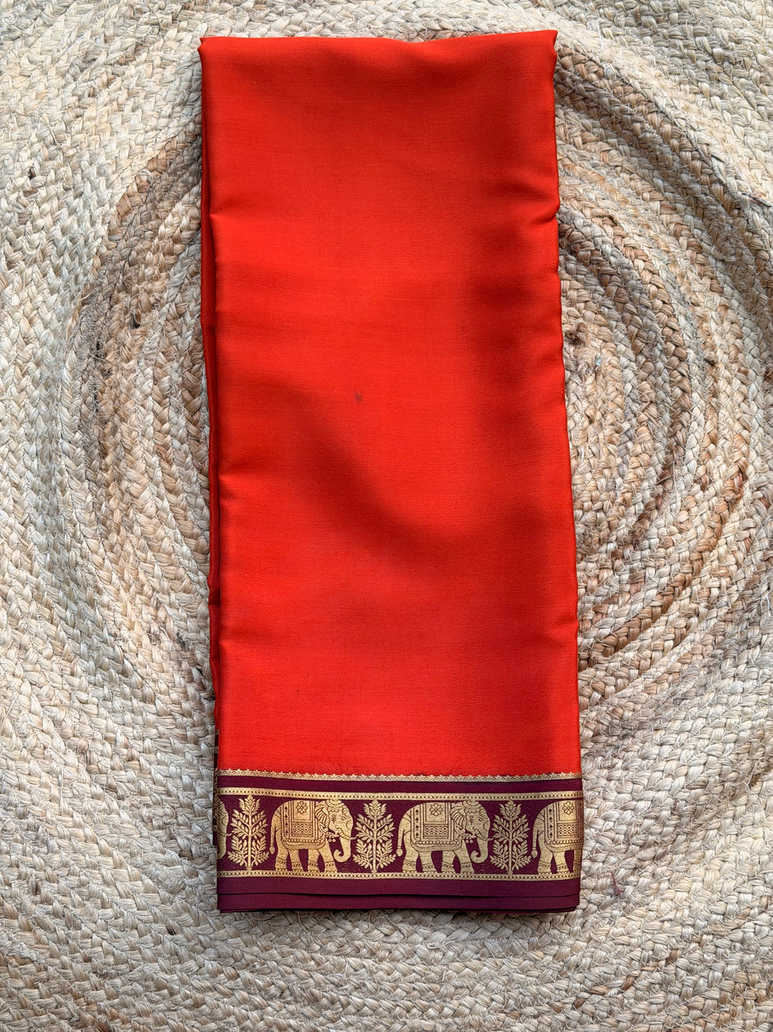 Rust orange and coffee brown elephant border Mysore silk 120gsm