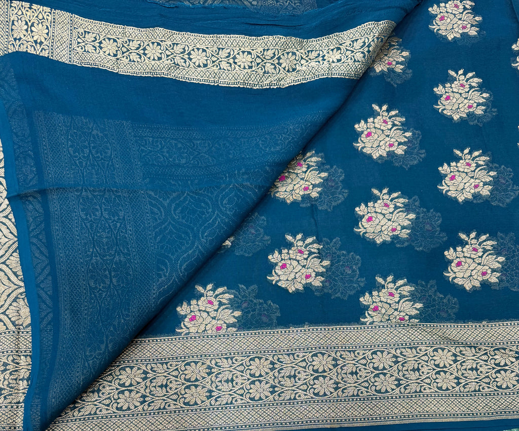 Peacock blue jaal pattern pure georgette with water zari saree