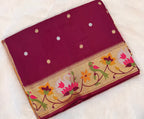 Wine pure paithani swan & peacock border saree