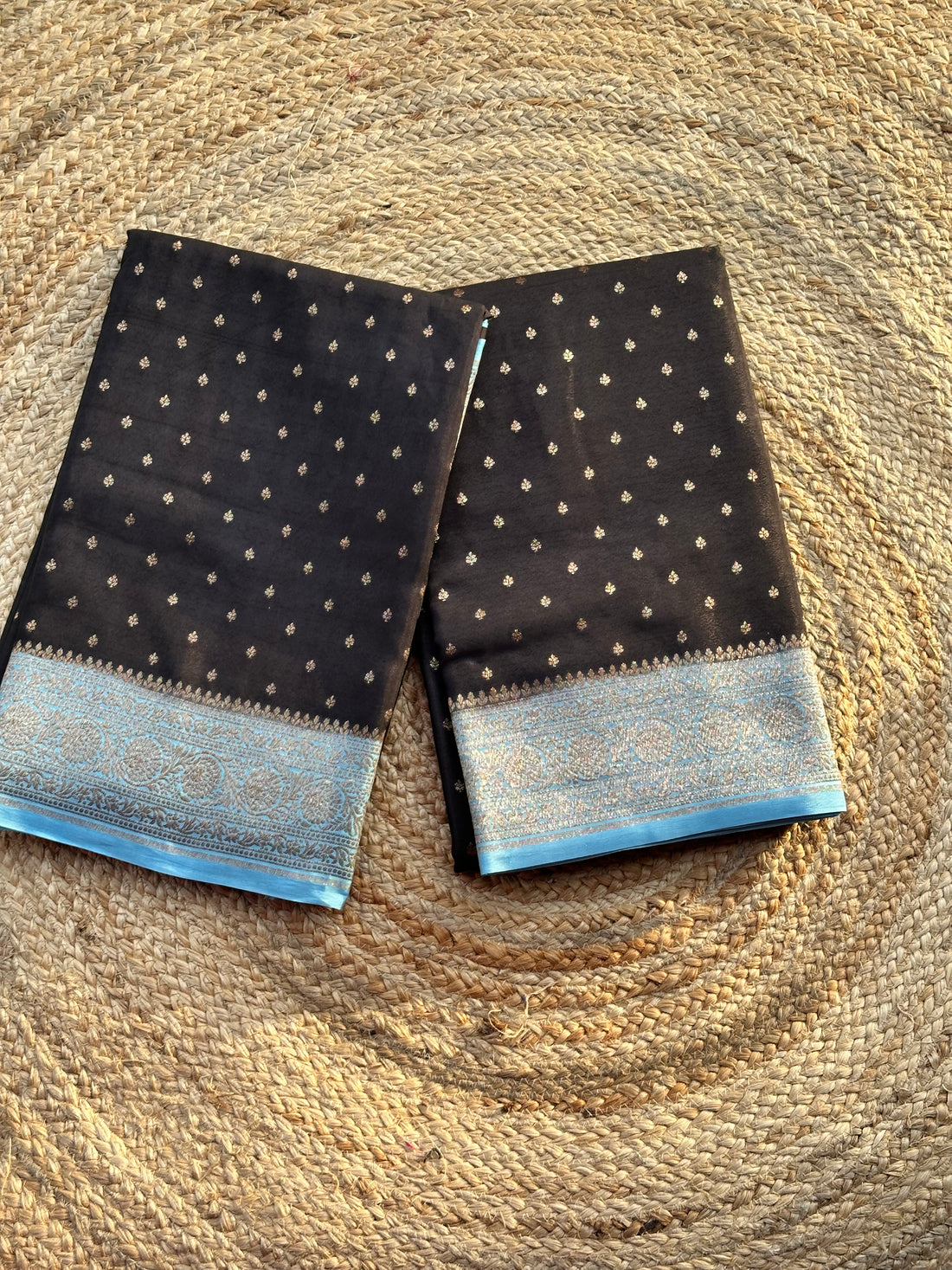 Black and sky blue Banarasi crepe chiffon sarees with brocade blouse