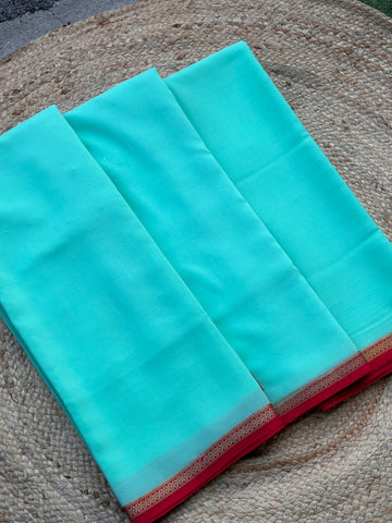 Teal blue with maroon Pure crepe Mysore Silk with small solid border 110 gsm