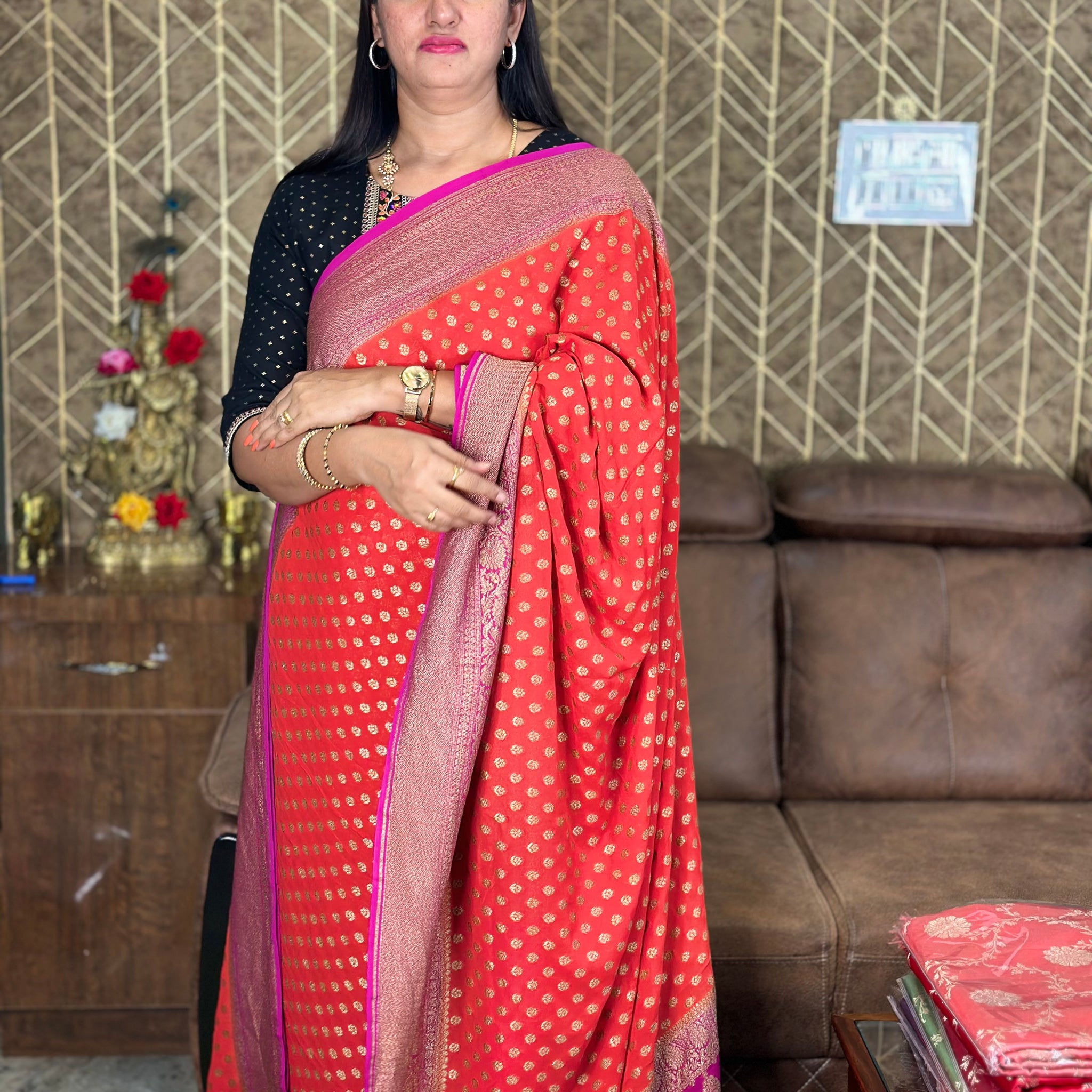 Orange and pink pure khaddi Georgette sarees.