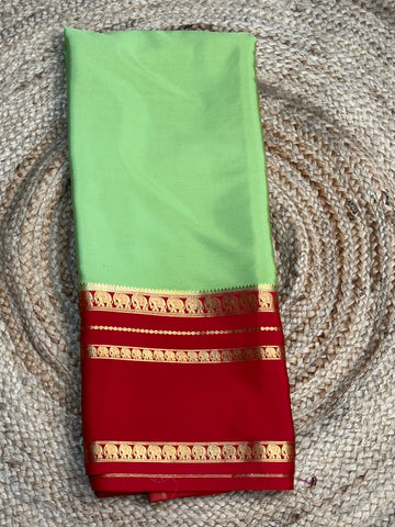 Pista green with red pure Mysore silk crepe with elephant bentex border