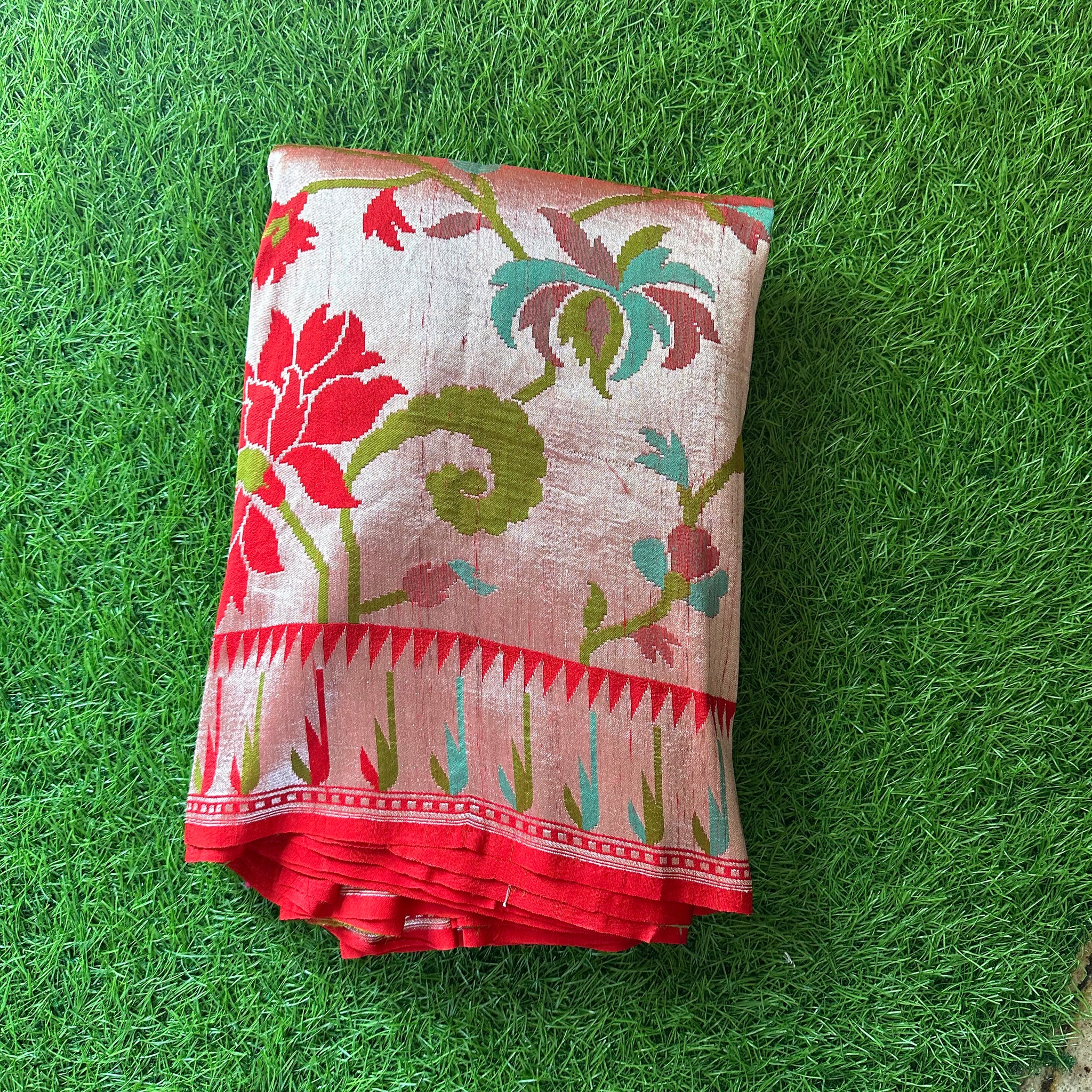 Red Pure tusser georgette with Paithani weaving and muniya border.