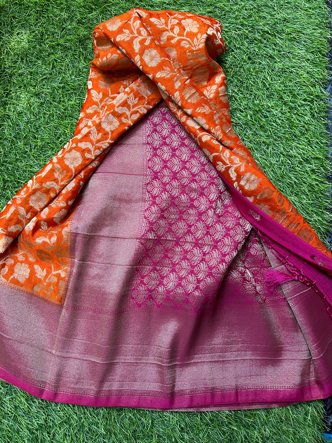 Designer georgette orange with pink shade.