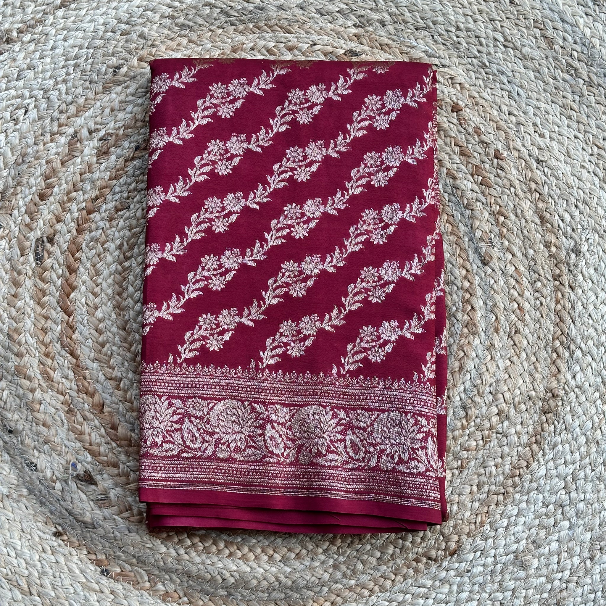 Maroon jaal self crepe chiffon sarees
