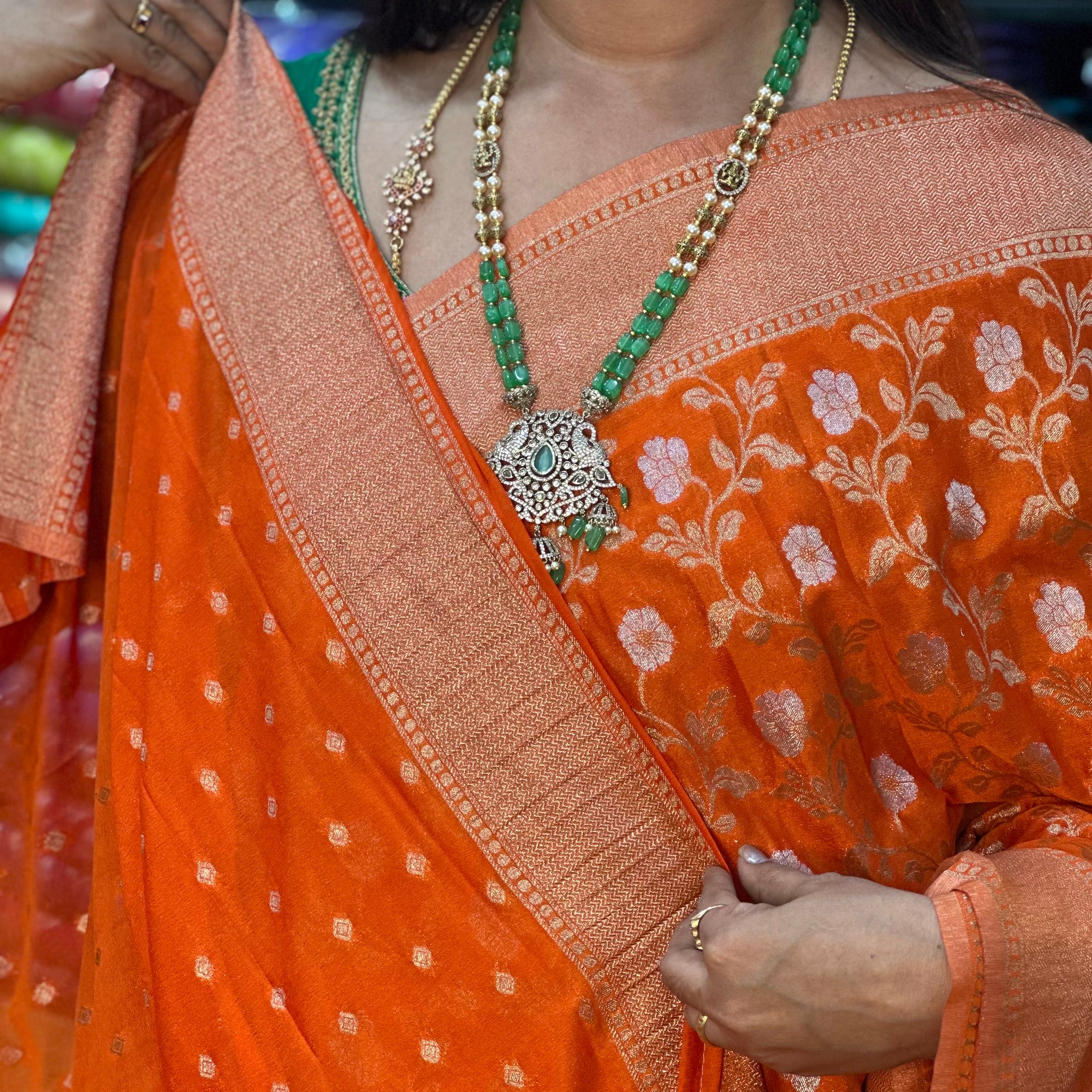 Orange designer georgette sarees