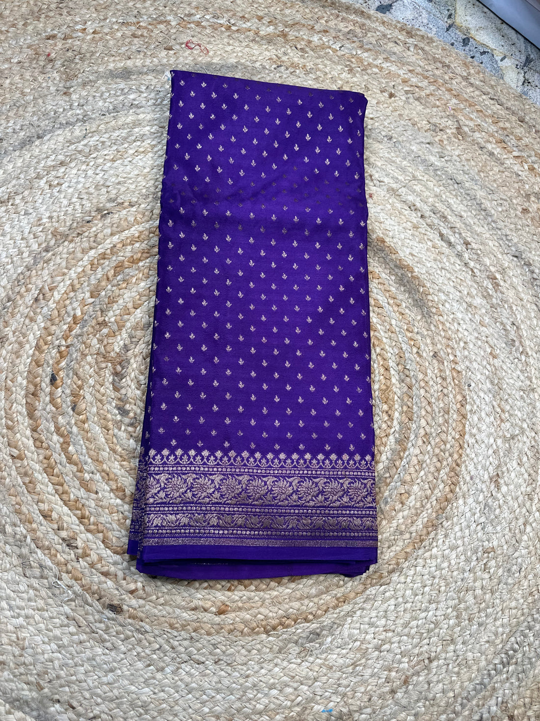 Dark purple crepe chiffon handloom saree with brocade blouse.