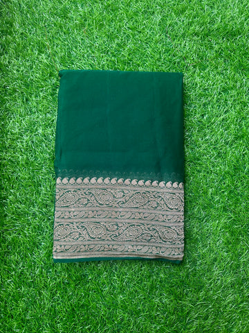 Pure Georgette Banaras. Bottle green shade, rich pallu and blouse.