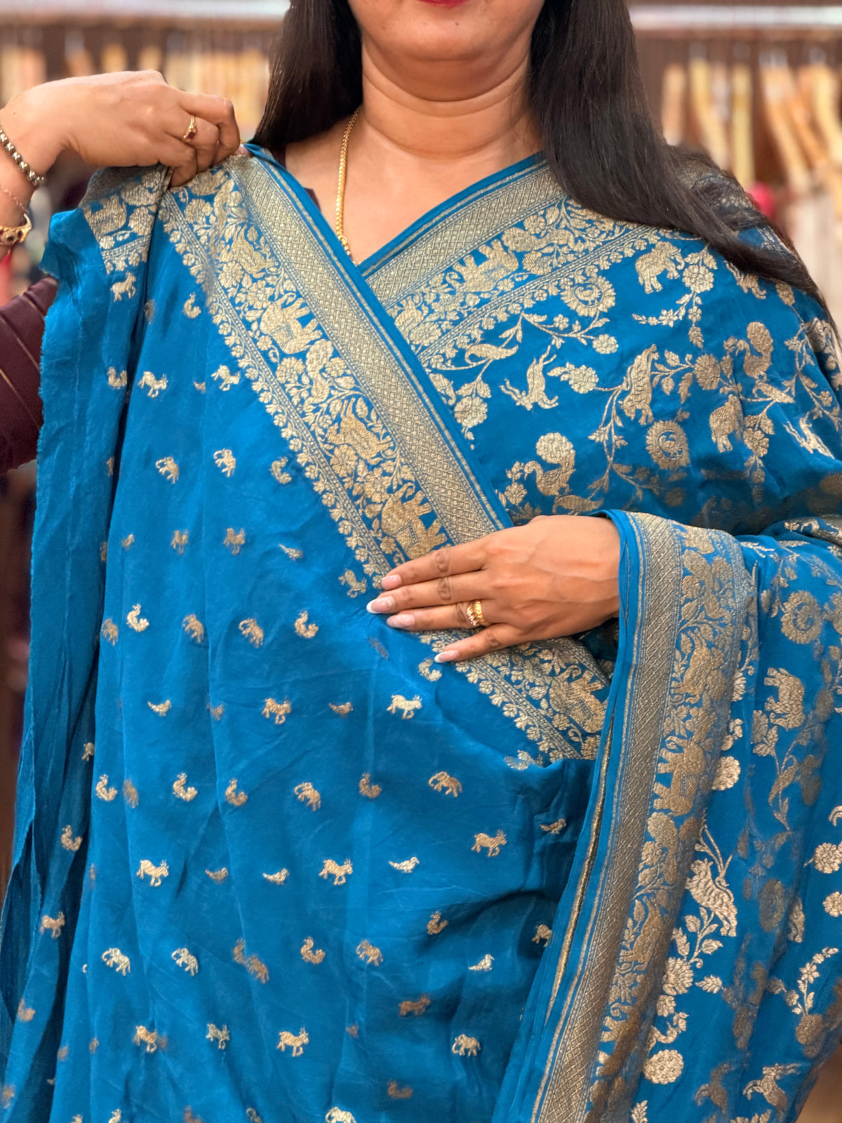 Peacock blue animal motive pure crepe Banaras