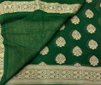 Bottle green pure georgette with water zari saree