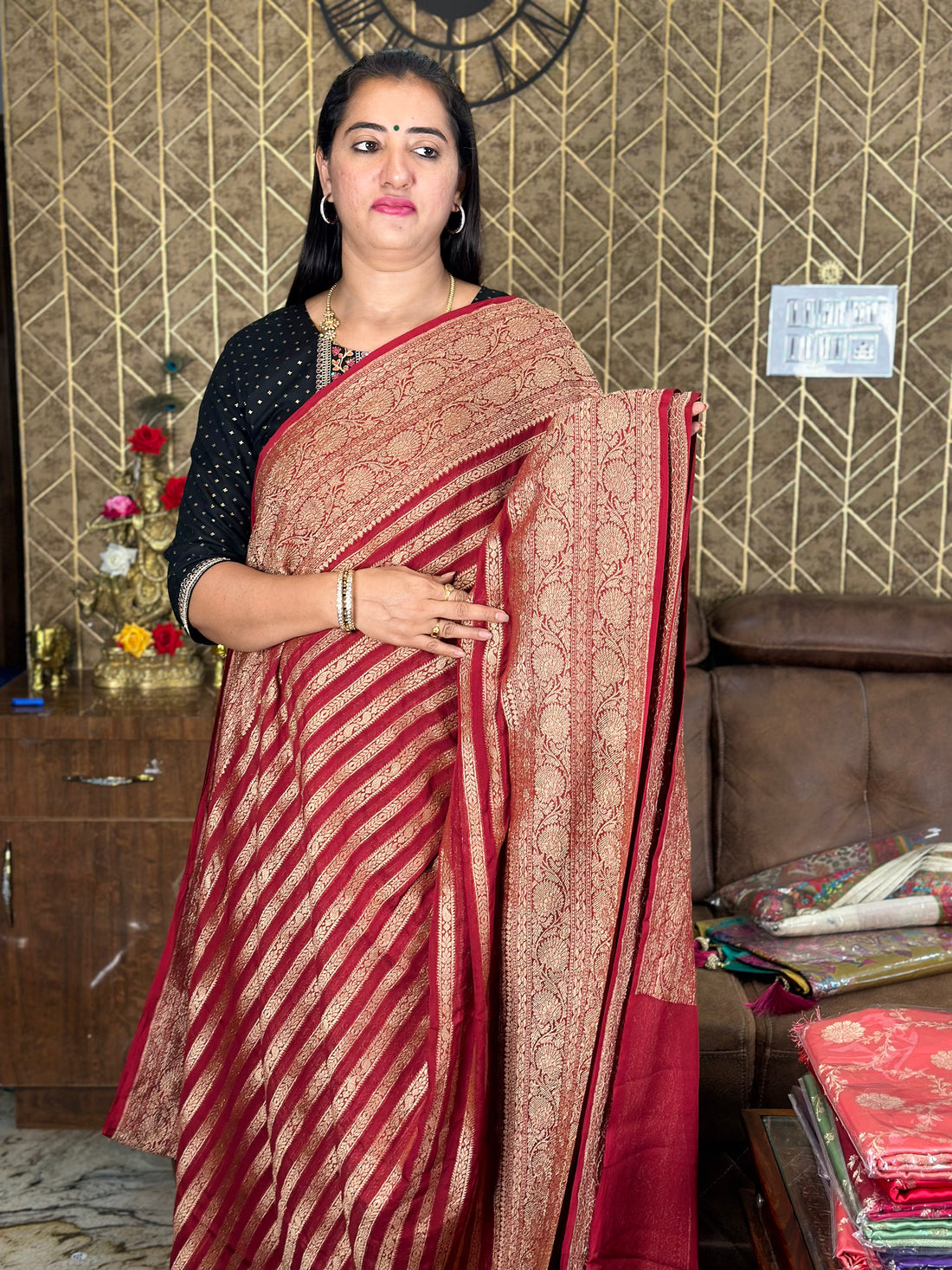 Maroon Pure khaddi Georgette saree with horizontal stripes.