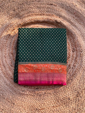 Dark green and orange pure crepe banaras silk sarees