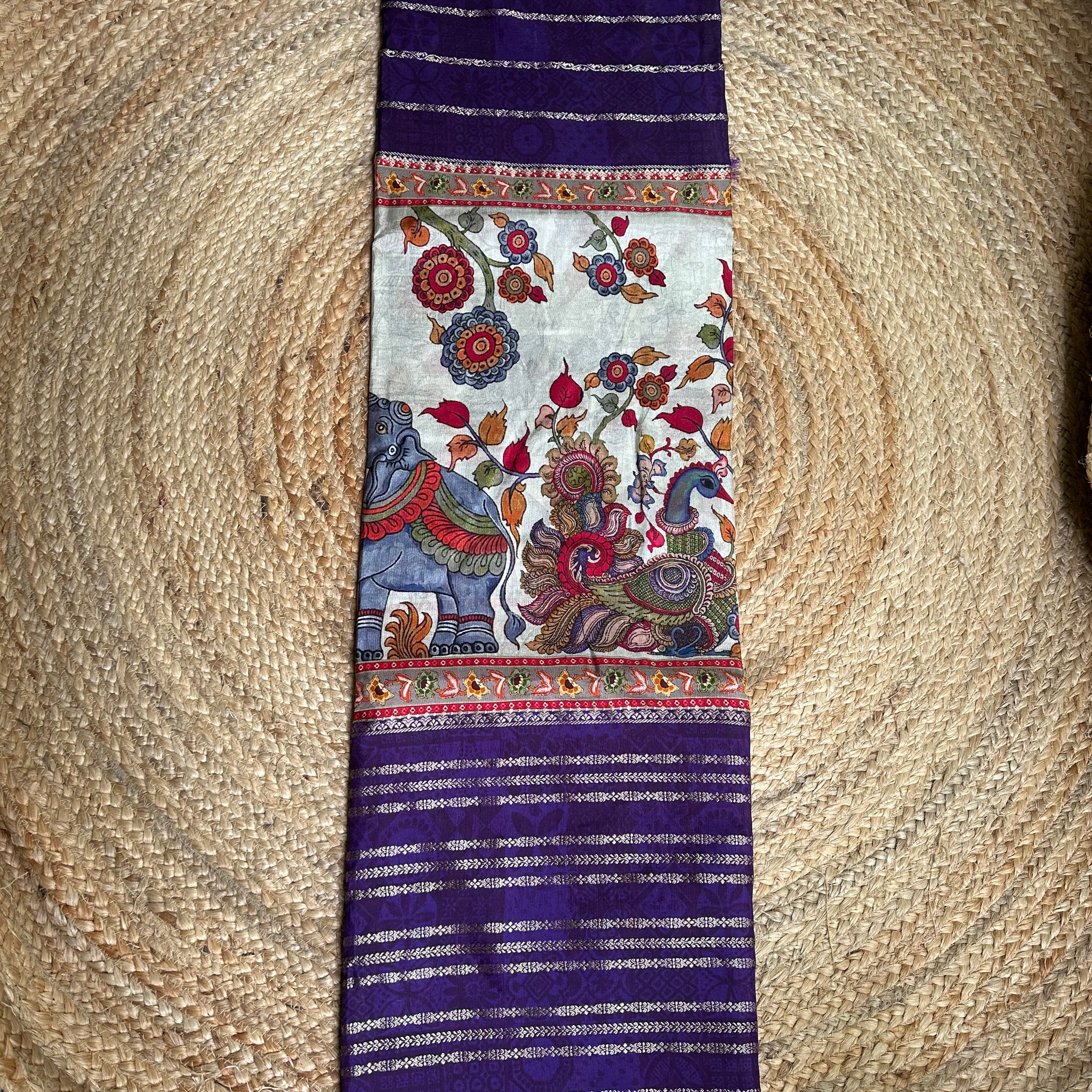 Purple and white central digital kalamkari sarees.